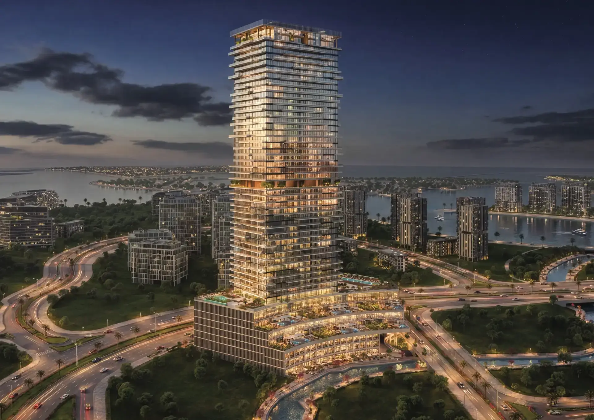 Radiant Terrace tower illuminated at night above Al Reem Island's canal-front promenade